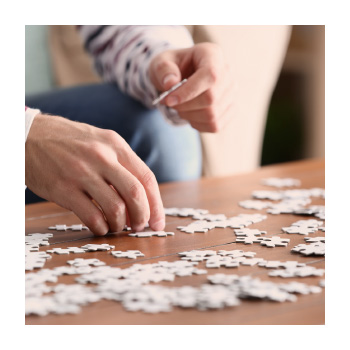 Image of a person doing a puzzle