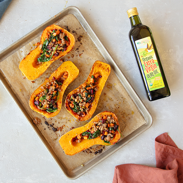 Sausage-Stuffed Butternut Squash With Spinach, Pecans, and Cranberries